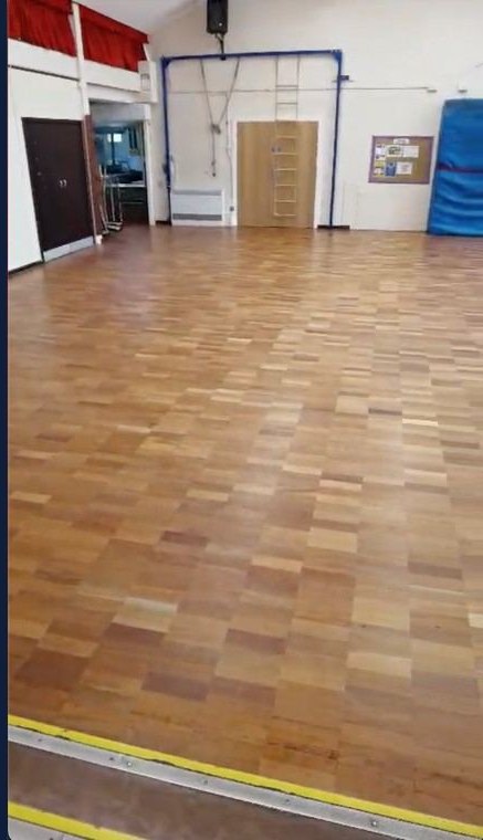 Primary school main hall floor after the post-refurbishment clean
